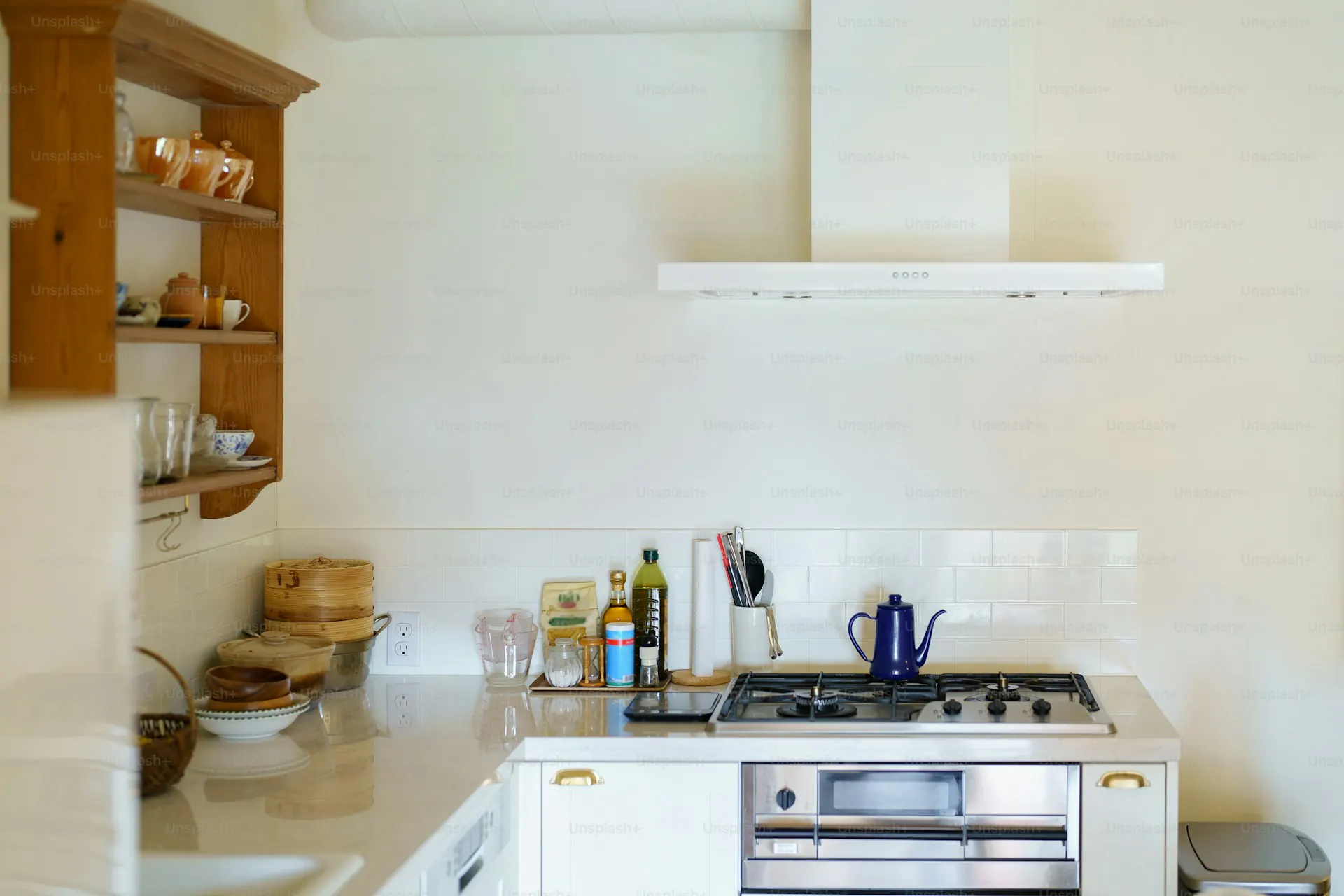 Compact walkable Hackensack NJ kitchen — bright white cabinets in a downtown apartment footprint